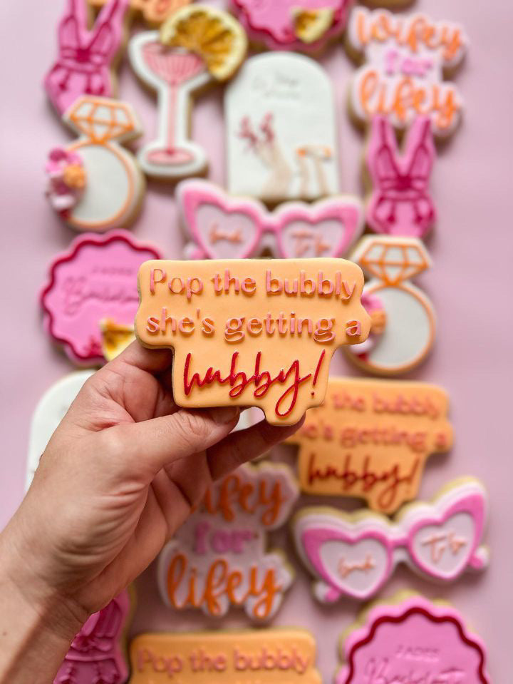 Pop the bubbly she's getting a hubby! debosser and matching cutter